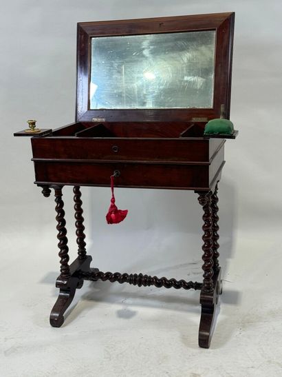 Small mahogany workbench opening with a flap...