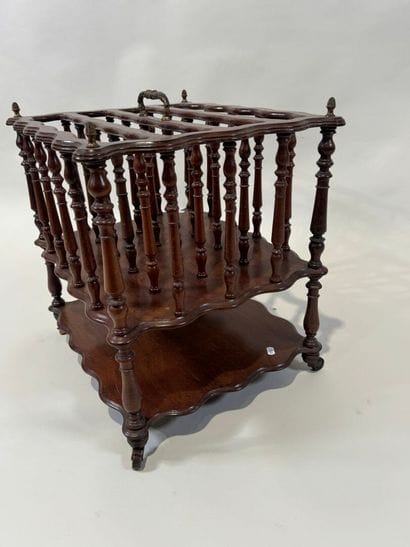 Mahogany magazine rack with openwork bars...