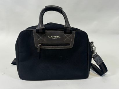 LANCEL.
Black canvas and taupe leather travel...