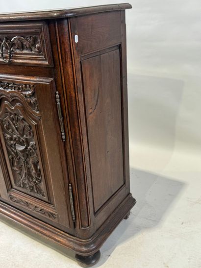 Molded and carved wooden sideboard opening...