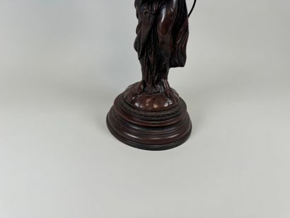 Three-armed resin lamp depicting a woman...