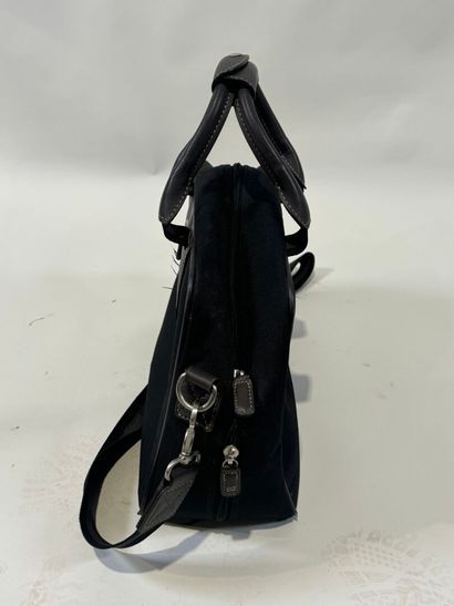 LANCEL.
Black canvas and taupe leather travel...