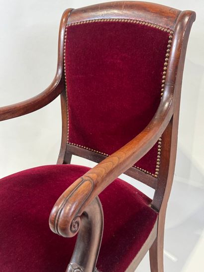 Moulded mahogany armchair with red velvet...