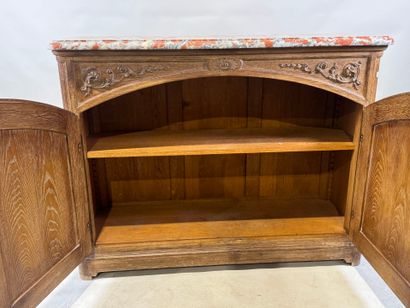 Light oak sideboard opening with two molded...