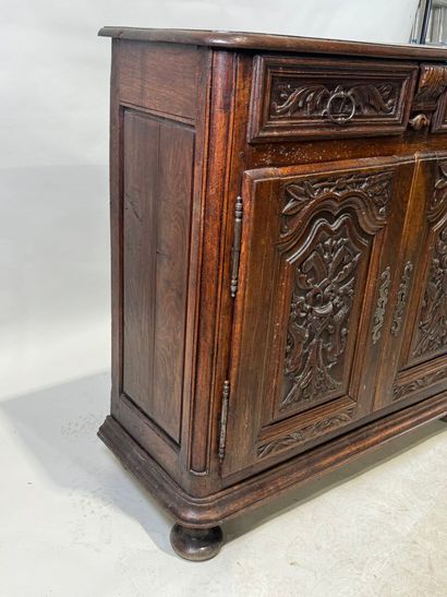 Molded and carved wooden sideboard opening...