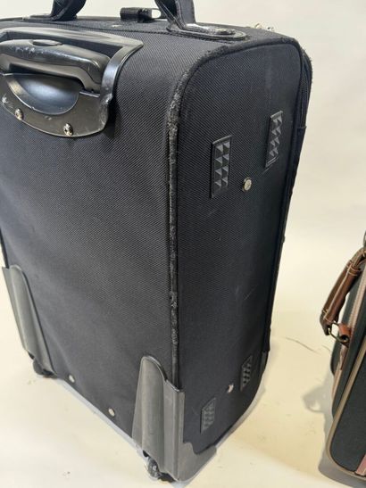 LANCEL.
Black canvas and leather travel case...