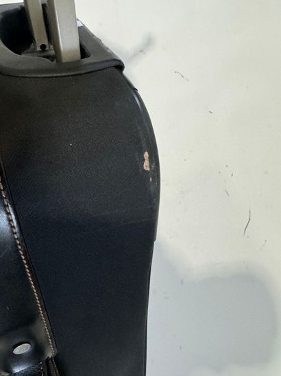 LANCEL. 
Travel suitcase or handbag on wheels...