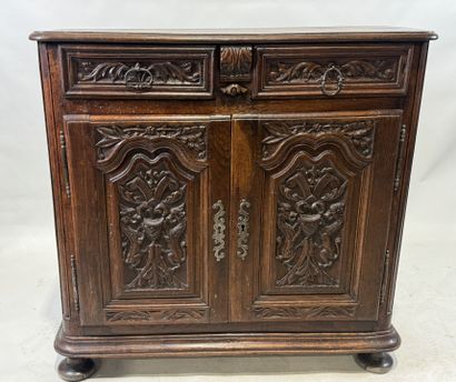 Molded and carved wooden sideboard opening...