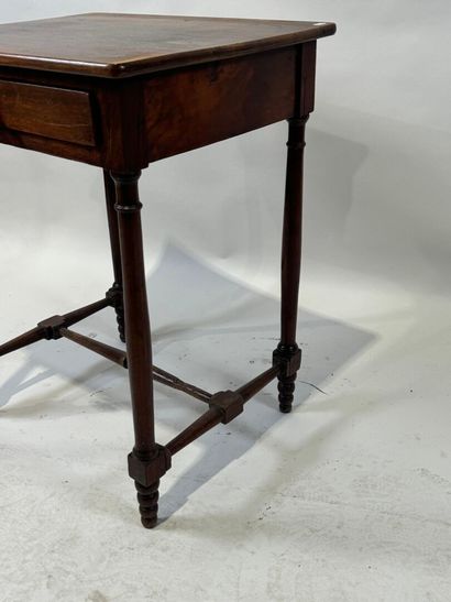Small wooden child's desk opening with one...