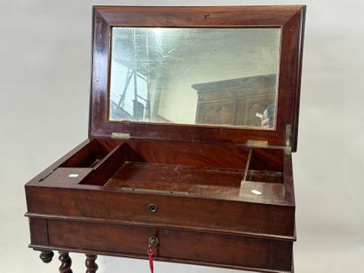 Small mahogany workbench opening with a flap...