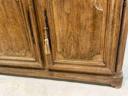 Light oak sideboard opening with two molded...