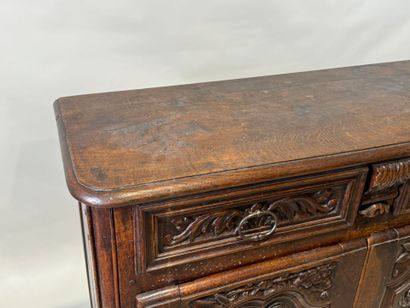 Molded and carved wooden sideboard opening...