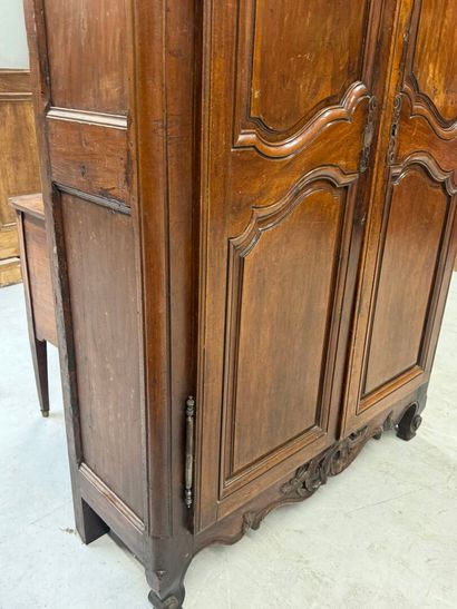 Rustic walnut cabinet opening with two doors.
19th...