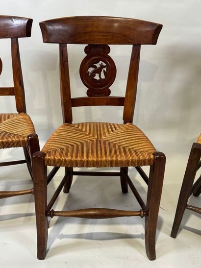 Two pairs of walnut chairs, straw-bottomed...
