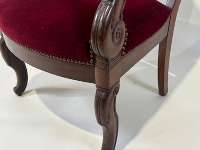 Moulded mahogany armchair with red velvet...