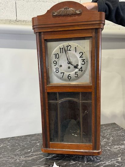 Wood and metal chime with eight hammers.
78...