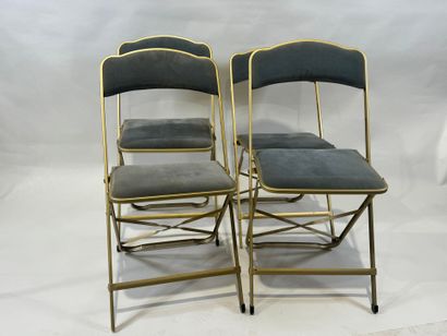 Set of four folding chairs in gilded metal,...