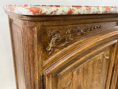 Light oak sideboard opening with two molded...