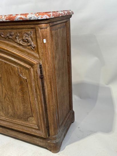 Light oak sideboard opening with two molded...