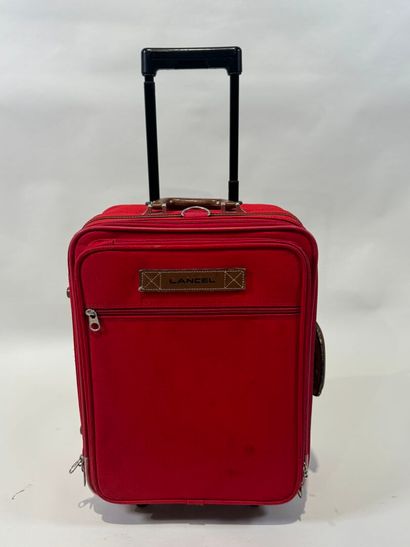 LANCEL.
Travel or hand luggage on wheels...
