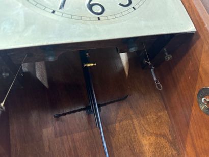 Wood and metal chime with eight hammers.
78...