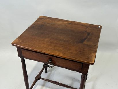 Small wooden child's desk opening with one...