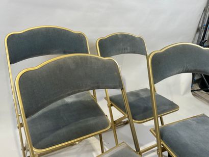 Set of four folding chairs in gilded metal,...