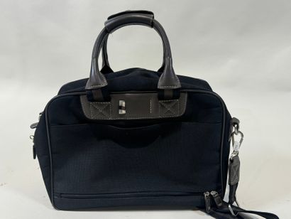 LANCEL.
Black canvas and taupe leather travel...