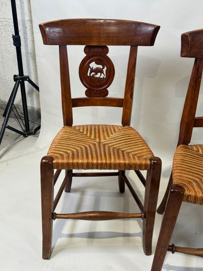 Two pairs of walnut chairs, straw-bottomed...
