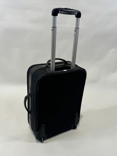 LANCEL. 
Travel suitcase or handbag on wheels...