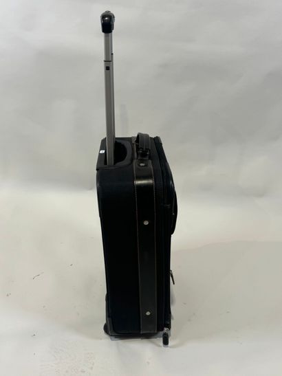 LANCEL. 
Travel suitcase or handbag on wheels...