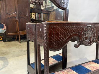 Molded and carved walnut console and mirror...