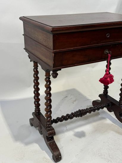 Small mahogany workbench opening with a flap...