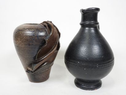 Set including :
- Black-glazed ceramic pitcher,...