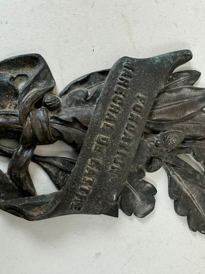 Decorative bronze sconce in the form of foliage...