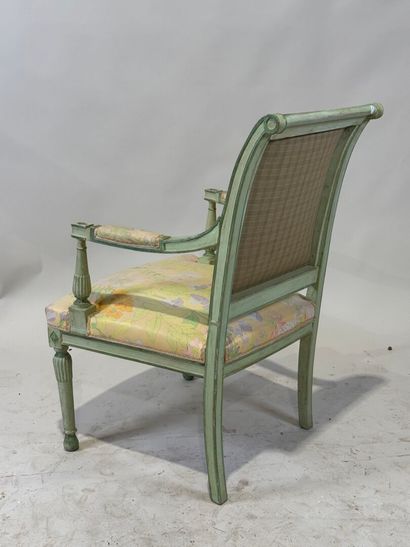 Green lacquered molded wood armchair, floral...