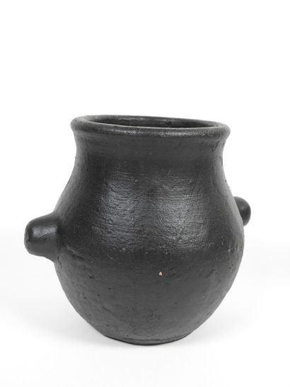 Set including :
- Black-glazed ceramic pitcher,...