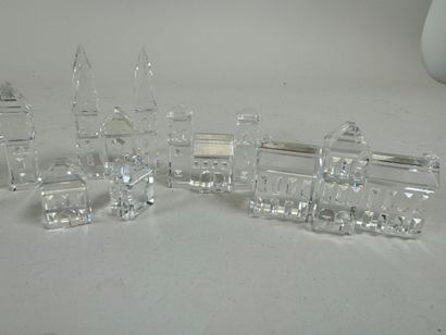 SWAROVSKI.
Set of 8 small crystal buildings.
Size...