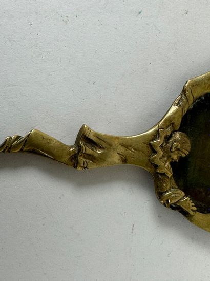 Small bronze faceplate with Pierrots and...