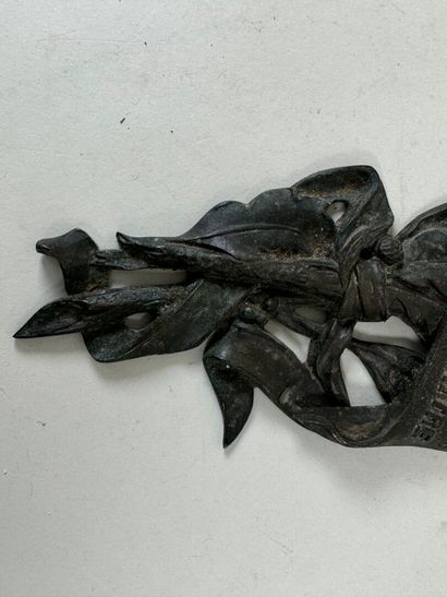 Decorative bronze sconce in the form of foliage...