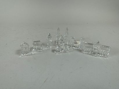 SWAROVSKI.
Set of 8 small crystal buildings.
Size...