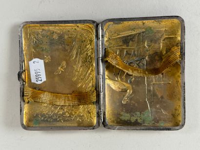 Cigarette box in repoussé silver-plated metal,...