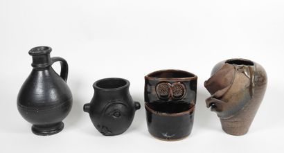 Set including :
- Black-glazed ceramic pitcher,...
