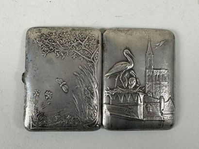 Cigarette box in repoussé silver-plated metal,...