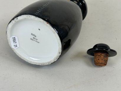 ROBJ in PARIS.
Polychrome porcelain bottle...