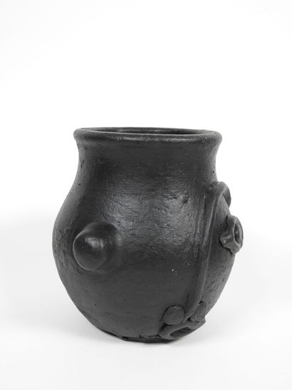 Set including :
- Black-glazed ceramic pitcher,...