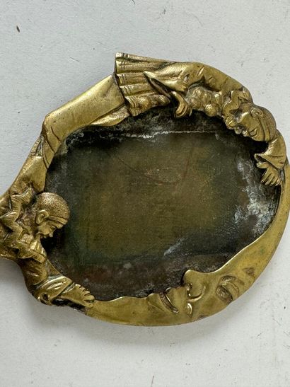 Small bronze faceplate with Pierrots and...