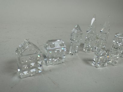 SWAROVSKI.
Set of 8 small crystal buildings.
Size...