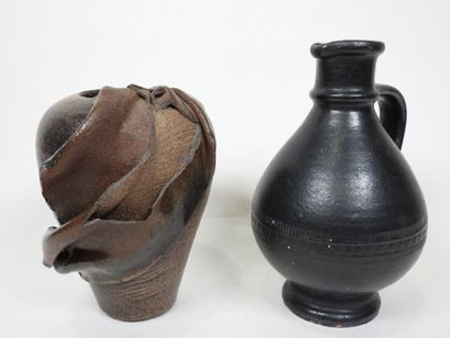 Set including :
- Black-glazed ceramic pitcher,...