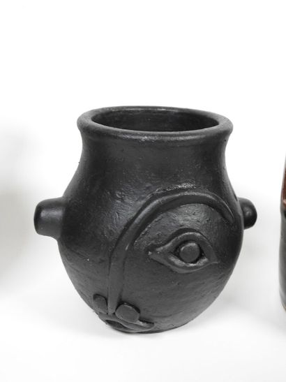 Set including :
- Black-glazed ceramic pitcher,...